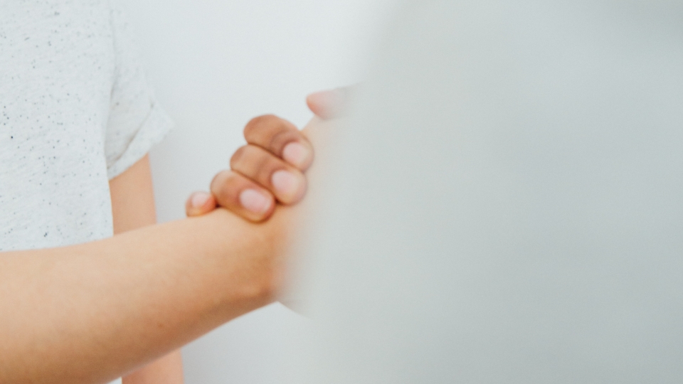 Close up of people shaking hands